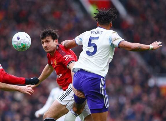 Harry Maguire of Manchester United, ManU and Tyrone Mings of Aston Villa Manchester United v Aston Villa, Premier League, Football, Old Trafford, Manchester, UK - 15 Mar 2026Manchester Old Trafford United Kingdom EDITORIAL USE ONLY No use with unauthorised audio, video, data, fixture lists, club league logos or live services. Online in-match use limited to 120 images, no video emulation. No use in betting, games or single club league player publications. Copyright: xMattxWest Shutterstockx 16757312k