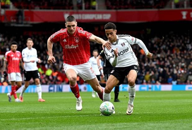 Nikola Milenkovic of Nottingham Forest and Joshua King of Fulham Nottingham Forest v Fulham, Premier League, Football, City Ground, Nottingham, UK - 15 Mar 2026Nottingham City Ground United Kingdom EDITORIAL USE ONLY No use with unauthorised audio, video, data, fixture lists, club league logos or live services. Online in-match use limited to 120 images, no video emulation. No use in betting, games or single club league player publications. Copyright: xAnnaxGowthorpe Shutterstockx 16757313bc