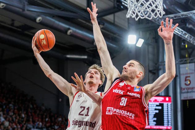 Justus Hollatz (FC Bayern Muenchen Basketball, 21), Daniel Keppeler (BMA365 Bamberg Baskets, 31), BMA365 Bamberg Baskets vs. FC Bayern Muenchen Basketball, Basketball, easyCredit BBL, 24. Spieltag, 15.03.2026 BMA365 Bamberg Baskets vs. FC Bayern Muenchen Basketball, Basketball, easyCredit BBL, 24. Spieltag, 15.03.2026 Bamberg Copyright: xEibner-Pressefoto G.xSantemizx EP_EER