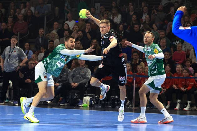 DEU, DHB, 1.HBL, Fuechse Berlin vs.Erlangen, 15.03.2026, Max-Schmeling-Halle, Berlin, DEU, DHB, 1.HBL, Fuechse Berlin vs.Erlangen, im Bild Nejc Cehte (Fuechse Berlin 22), Mathias Gidsel (Fuechse Berlin 19), Sander Overjordet (Erlangen 8)