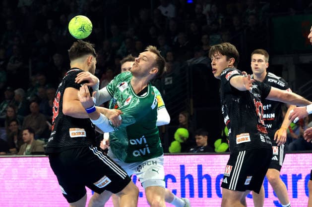 DEU, DHB, 1.HBL, Fuechse Berlin vs.Erlangen, 15.03.2026, Max-Schmeling-Halle, Berlin, DEU, DHB, 1.HBL, Fuechse Berlin vs.Erlangen, im Bild Mathias Gidsel (Fuechse Berlin 19), Tobias Buck (Erlangen 39), Florian Scheerer (Erlangen 10)