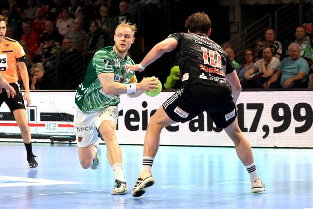 DEU, DHB, 1.HBL, Fuechse Berlin vs.Erlangen, 15.03.2026, Max-Schmeling-Halle, Berlin, DEU, DHB, 1.HBL, Fuechse Berlin vs.Erlangen, im Bild Matthes Langhoff (Fuechse Berlin 25), Florian Scheerer (Erlangen 10)