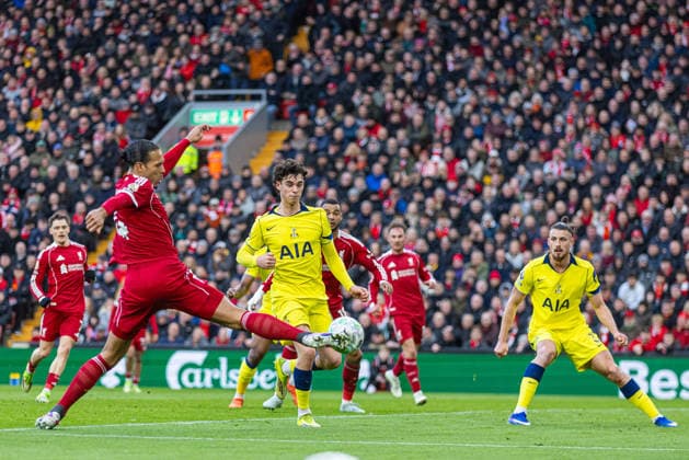 (260316) -- LIVERPOOL, March 16, 2026 -- Liverpool s captain Virgil van Dijk (2nd L) shoots during the English Premier League match between Liverpool FC and Tottenham Hotspur FC in Liverpool, Britain, on March 15, 2026. FOR EDITORIAL USE ONLY. NOT FOR SALE FOR MARKETING OR ADVERTISING CAMPAIGNS. NO USE WITH UNAUTHORIZED AUDIO, VIDEO, DATA, FIXTURE LISTS, CLUB LEAGUE LOGOS OR LIVE SERVICES. ONLINE IN-MATCH USE LIMITED TO 45 IMAGES, NO VIDEO EMULATION. NO USE IN BETTING, GAMES OR SINGLE CLUB LEAGUE PLAYER PUBLICATIONS. (SP)BRITAIN-LIVERPOOL-FOOTBALL-PREMIER LEAGUE-LIVERPOOL VS TOTTENHAM HOTSPUR LixYing