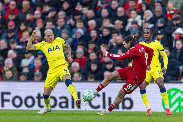 (260316) -- LIVERPOOL, March 16, 2026 -- Tottenham Hotspur s Richarlison de Andrade (L) is challenged by Liverpool s Dominik Szoboszlai during the English Premier League match between Liverpool FC and Tottenham Hotspur FC in Liverpool, Britain, on March 15, 2026. FOR EDITORIAL USE ONLY. NOT FOR SALE FOR MARKETING OR ADVERTISING CAMPAIGNS. NO USE WITH UNAUTHORIZED AUDIO, VIDEO, DATA, FIXTURE LISTS, CLUB LEAGUE LOGOS OR LIVE SERVICES. ONLINE IN-MATCH USE LIMITED TO 45 IMAGES, NO VIDEO EMULATION. NO USE IN BETTING, GAMES OR SINGLE CLUB LEAGUE PLAYER PUBLICATIONS. (SP)BRITAIN-LIVERPOOL-FOOTBALL-PREMIER LEAGUE-LIVERPOOL VS TOTTENHAM HOTSPUR LixYing