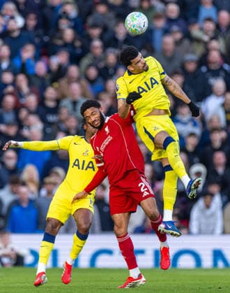 (260316) -- LIVERPOOL, March 16, 2026 -- Tottenham Hotspur s Dominic Solanke (Top) challenges for a header with Liverpool s Joe Gomez (C) during the English Premier League match between Liverpool FC and Tottenham Hotspur FC in Liverpool, Britain, on March 15, 2026. FOR EDITORIAL USE ONLY. NOT FOR SALE FOR MARKETING OR ADVERTISING CAMPAIGNS. NO USE WITH UNAUTHORIZED AUDIO, VIDEO, DATA, FIXTURE LISTS, CLUB LEAGUE LOGOS OR LIVE SERVICES. ONLINE IN-MATCH USE LIMITED TO 45 IMAGES, NO VIDEO EMULATION. NO USE IN BETTING, GAMES OR SINGLE CLUB LEAGUE PLAYER PUBLICATIONS. (SP)BRITAIN-LIVERPOOL-FOOTBALL-PREMIER LEAGUE-LIVERPOOL VS TOTTENHAM HOTSPUR LixYing