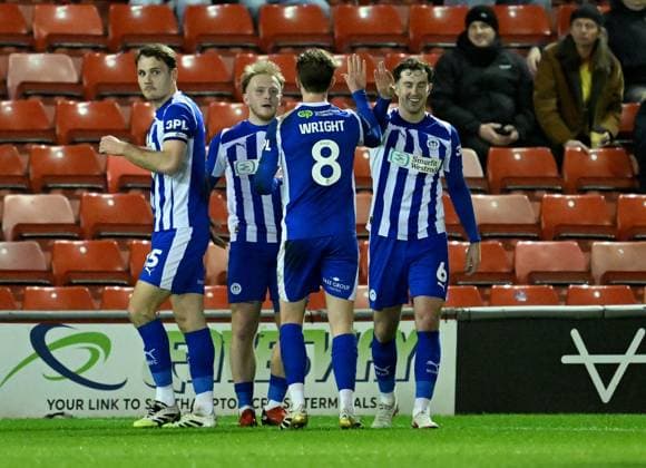 Joe Taylor of Wigan Athletic celebrates after scoring the team s first goal Barnsley v Wigan Athletic, Sky Bet League One, Football, Oakwell, Barnsley, UK - 17 Mar 2026Barnsley Oakwell United Kingdom EDITORIAL USE ONLY No use with unauthorised audio, video, data, fixture lists, club league logos or live services. Online in-match use limited to 120 images, no video emulation. No use in betting, games or single club league player publications. Copyright: xAnnaxGowthorpe Shutterstockx 16776372u