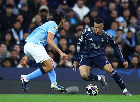 Kylian Mbappe of Real Madrid and Nathan Ake of Manchester City Manchester City v Real Madrid, UEFA Champions League, Round of 16, Second Leg, Football, Etihad Stadium, Manchester, UK - 17 Mar 2026Manchester Etihad Stadium United Kingdom EDITORIAL USE ONLY No use with unauthorised audio, video, data, fixture lists, club league logos or live services. Online in-match use limited to 120 images, no video emulation. No use in betting, games or single club league player publications. Copyright: xMattxWest Shutterstockx 16776379bb