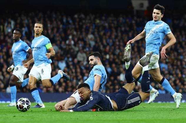 Kylian Mbappe of Real Madrid and Rayan Ait-Nouri of Manchester City Manchester City v Real Madrid, UEFA Champions League, Round of 16, Second Leg, Football, Etihad Stadium, Manchester, UK - 17 Mar 2026Manchester Etihad Stadium United Kingdom EDITORIAL USE ONLY No use with unauthorised audio, video, data, fixture lists, club league logos or live services. Online in-match use limited to 120 images, no video emulation. No use in betting, games or single club league player publications. Copyright: xMattxWest Shutterstockx 16776379bd