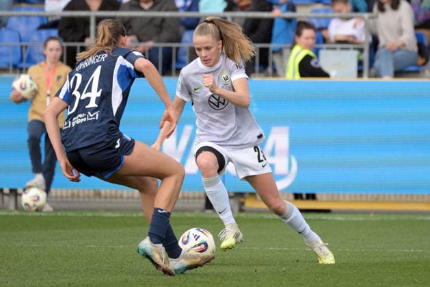 Vivien Endemann (VfL Wolfsburg, 25) am mit Ball im Zweikampf mit Svenja Voehringer (TSG 1899 Hoffenheim, 34) GER, TSG 1899 Hoffenheim vs. VfL Wolfsburg, Fussball, Google Pixel Frauen-Bundesliga, Saison 2025 2026, 21.03.2026 DFB DFL regulations prohibit any use of photographs as image sequences and or quasi-video GER, TSG 1899 Hoffenheim vs. VfL Wolfsburg, Fussball, Google Pixel Frauen-Bundesliga, Saison 2025 2026, 21.03.2026 Hoffenheim Copyright: xEibner-Pressefoto TobiasxBaurx EP_TBR