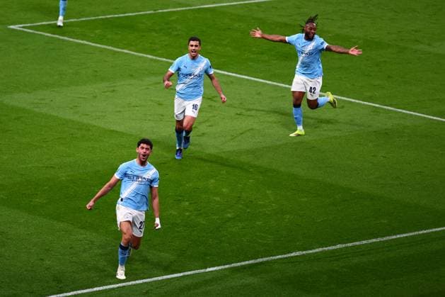 Matheus Nunes of Manchester City celebrates the 2nd goal scored by Nico O Reilly Arsenal v Manchester City, EFL Carabao Cup, Final, Football, Wembley Stadium, London, UK - 22 Mar 2026London Wembley Stadium United Kingdom EDITORIAL USE ONLY No use with unauthorised audio, video, data, fixture lists, club league logos or live services. Online in-match use limited to 120 images, no video emulation. No use in betting, games or single club league player publications. Copyright: xJamesxMarsh Shutterstockx 16783338nq
