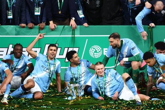 Erling Haaland of Manchester City and Rodri celebrate with the Carabao Cup Arsenal v Manchester City, EFL Carabao Cup, Final, Football, Wembley Stadium, London, UK - 22 Mar 2026London Wembley Stadium United Kingdom EDITORIAL USE ONLY No use with unauthorised audio, video, data, fixture lists, club league logos or live services. Online in-match use limited to 120 images, no video emulation. No use in betting, games or single club league player publications. Copyright: xJamesxMarsh Shutterstockx 16783338pd