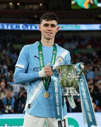 Phil Foden of Manchester City holds the 2026 Carabao Cup trophy in front of the fans Arsenal v Manchester City, EFL Carabao Cup, Final, Football, Wembley Stadium, London, UK - 22 Mar 2026London Wembley Stadium United Kingdom EDITORIAL USE ONLY No use with unauthorised audio, video, data, fixture lists, club league logos or live services. Online in-match use limited to 120 images, no video emulation. No use in betting, games or single club league player publications. Copyright: xKieranxMcManus Shutterstockx 16783332mf