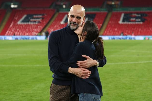 Manchester City manager Pep Guardiola celebrates with their daughter after the game Arsenal v Manchester City, EFL Carabao Cup, Final, Football, Wembley Stadium, London, UK - 22 Mar 2026London Wembley Stadium United Kingdom EDITORIAL USE ONLY No use with unauthorised audio, video, data, fixture lists, club league logos or live services. Online in-match use limited to 120 images, no video emulation. No use in betting, games or single club league player publications. Copyright: xKieranxMcManus Shutterstockx 16783332ms