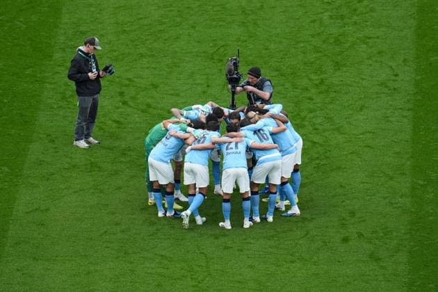 Manchester City players huddle before kick-off Arsenal v Manchester City, EFL Carabao Cup, Final, Football, Wembley Stadium, London, UK - 22 Mar 2026London Wembley Stadium United Kingdom EDITORIAL USE ONLY No use with unauthorised audio, video, data, fixture lists, club league logos or live services. Online in-match use limited to 120 images, no video emulation. No use in betting, games or single club league player publications. Copyright: xJoexToth Shutterstockx 16783340gw