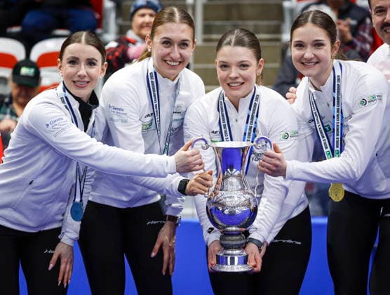 March 22, 2026, Calgary, Ab, CANADA: Switzerland skip Xenia Schwaller, left to right, third Selina Gafner, vice-skip Fabienne Rieder and lead Selina Rychiger hold the trophy after defeating Canada to win the World WomenöÄÃ s Curling Championship in Calgary, Sunday, March 22, 2026. Selina Rychiger, Fabienne Rieder, Selina Gafner, Xenia Schwaller - ZUMAc35_ 20260322_zaf_c35_063 Copyright: xJeffxMcintoshx