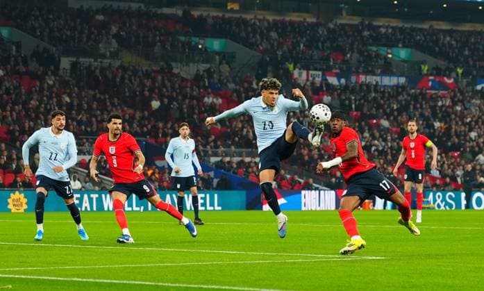 Maximiliano Araujo of Uruguay nicks the ball away from Noni Madueke of England as he shapes to shoot England v Uruguay, International Football, Friendly, Football, Wembley Stadium, London, UK - 27 Mar 2026London Wembley Stadium United Kingdom EDITORIAL USE ONLY No use with unauthorised audio, video, data, fixture lists, club league logos or live services. Online in-match use limited to 120 images, no video emulation. No use in betting, games or single club league player publications. Copyright: xJavierxGarcia Shutterstockx 16788932i