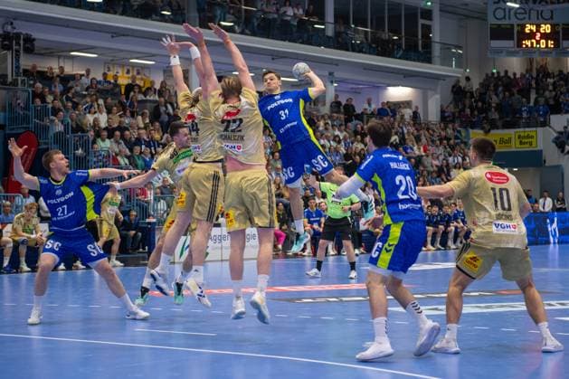 Kay Smits, Rueckraum, (VfL Gummersbach 31), Kristjan Horžen, Kreislaeufer, (VfL Gummersbach 27), Ludwig Hallbaeck, Rueckraum, (VfL Gummersbach 20), Marian Michalczik, Rueckraum, (TSV Hannover-Burgdorf 22),VfL Gummersbach vs. TSV Hannover-Burgdorf, Daikin Handball Bundesliga, Herren , 26. Spieltag, 28.03.2026 Gummersbach NRW Deutschland