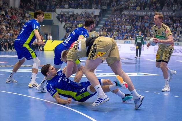Julian Koester, Rueckraum, (VfL Gummersbach 7), Kay Smits, Rueckraum, (VfL Gummersbach 31), Justus Fischer, Kreislaeufer, (TSV Hannover-Burgdorf 54),Marian Michalczik, Rueckraum, (TSV Hannover-Burgdorf 22),VfL Gummersbach vs. TSV Hannover-Burgdorf, Daikin Handball Bundesliga, Herren , 26. Spieltag, 28.03.2026 Gummersbach NRW Deutschland