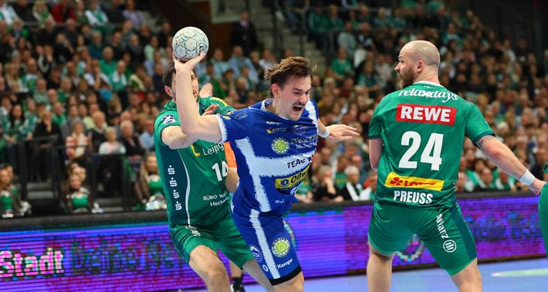 Leipzig, 29.03.2026, QUARTERBACK ARENA, Spieltag 26, Handball Bundesliga , SC DHFK Leipzig vs. ThSV Eisenach , Im Bild v.l.: Marko Mamic (14, Leipzig), Felix Aellen (22, Eisenach) und Moritz Preuss (24, Leipzig) ,