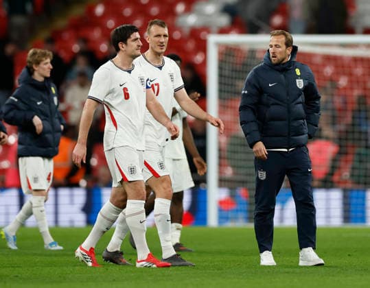 London, England, 31st March 2026. Non playing harry Kane of England (r) walks off with Harry Maguire and and Dan Burn of England during the England vs Japan International Friendly, Länderspiel, Nationalmannschaft match at Wembley Stadium, London. Picture credit should read: Matthew Impey Sportimage EDITORIAL USE ONLY. No use with unauthorised audio, video, data, fixture lists, club league logos or live services. Online in-match use limited to 120 images, no video emulation. No use in betting, games or single club league player publications. SPI_071_MI_Eng_Japan SPI-4662-0070
