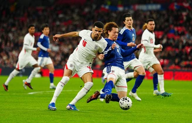 Dominic Solanke of England battles with Ayumu Seko of Japan England v Japan, International Football, Friendly, Football, Wembley Stadium, London, UK - 31 Mar 2026London Wembley Stadium United Kingdom EDITORIAL USE ONLY No use with unauthorised audio, video, data, fixture lists, club league logos or live services. Online in-match use limited to 120 images, no video emulation. No use in betting, games or single club league player publications. Copyright: xJavierxGarcia Shutterstockx 16808984bq