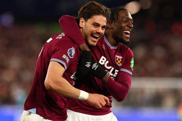 Konstantinos Mavropanos of West Ham United celebrates with Axel Disasi after he scored for 4-0 - West Ham United v Wolverhampton Wanderers, Premier League, London Stadium, London, UK - 10th Aptil 2026. Editorial Use Only - DataCo restrictions apply West Ham United v Wolverhampton Wanderers, Premier League, Football, London Stadium, London, UK - 10 Apr 2026London London Stadium United Kingdom EDITORIAL USE ONLY No use with unauthorised audio, video, data, fixture lists, club league logos or live services. Online in-match use limited to 120 images, no video emulation. No use in betting, games or single club league player publications. Copyright: xMDI Shutterstockx 16824051r