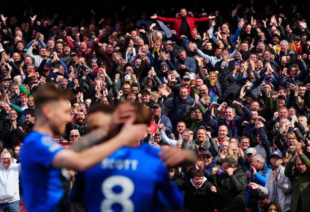 Bournemouth fans celebrate after Alex Scott scored a goal to make it 2-1 Arsenal v AFC Bournemouth, Premier League, Football, Emirates Stadium, London, UK - 11 Apr 2026London Emirates Stadium United Kingdom EDITORIAL USE ONLY No use with unauthorised audio, video, data, fixture lists, club league logos or live services. Online in-match use limited to 120 images, no video emulation. No use in betting, games or single club league player publications. Copyright: xJavierxGarcia Shutterstockx 16823522ar