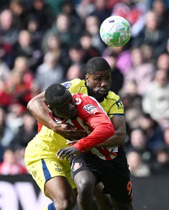 Kevin Danso of Tottenham Hotspur and Brian Brobbey of Sunderland Sunderland v Tottenham Hotspur, Premier League, Football, Stadium of Light, Sunderland, UK - 12 Apr 2026Sunderland Stadium of Light United Kingdom EDITORIAL USE ONLY No use with unauthorised audio, video, data, fixture lists, club league logos or live services. Online in-match use limited to 120 images, no video emulation. No use in betting, games or single club league player publications. Copyright: xGreigxCowie Shutterstockx 16823609bb
