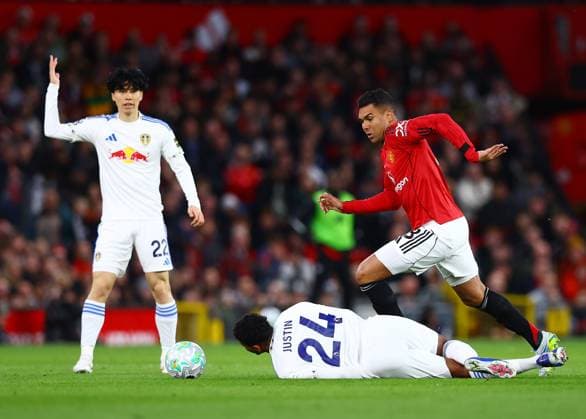 Casemiro of Manchester United, ManU and James Justin of Leeds United Manchester United v Leeds United, Premier League, Football, Old Trafford, Manchester, UK - 13 Apr 2026Manchester Old Trafford United Kingdom EDITORIAL USE ONLY No use with unauthorised audio, video, data, fixture lists, club league logos or live services. Online in-match use limited to 120 images, no video emulation. No use in betting, games or single club league player publications. Copyright: xMattxWest Shutterstockx 16827177n