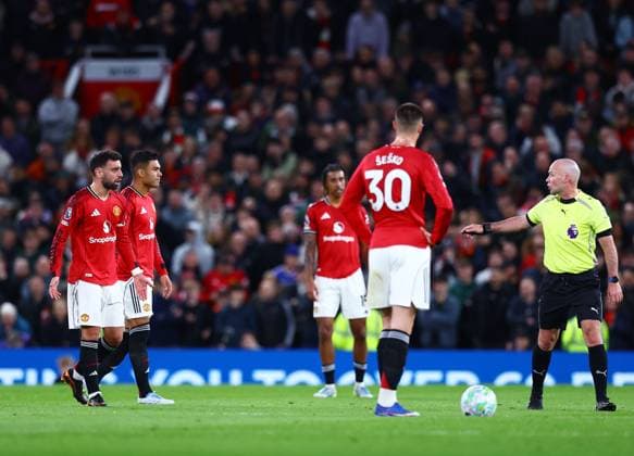 Bruno Fernandes of Manchester United, ManU reacts towards referee Paul Tierney Manchester United v Leeds United, Premier League, Football, Old Trafford, Manchester, UK - 13 Apr 2026Manchester Old Trafford United Kingdom EDITORIAL USE ONLY No use with unauthorised audio, video, data, fixture lists, club league logos or live services. Online in-match use limited to 120 images, no video emulation. No use in betting, games or single club league player publications. Copyright: xMattxWest Shutterstockx 16827177ad