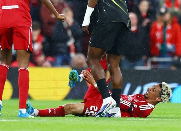 Hugo Ekitike of Liverpool feels the pain from an injury Liverpool v Paris Saint-Germain, UEFA Champions League, Quarter Final, Second Leg, Football, Anfield, Liverpool, UK - 14 Apr 2026Liverpool Anfield France EDITORIAL USE ONLY No use with unauthorised audio, video, data, fixture lists, club league logos or live services. Online in-match use limited to 120 images, no video emulation. No use in betting, games or single club league player publications. Copyright: xMattxWest Shutterstockx 16828520ad