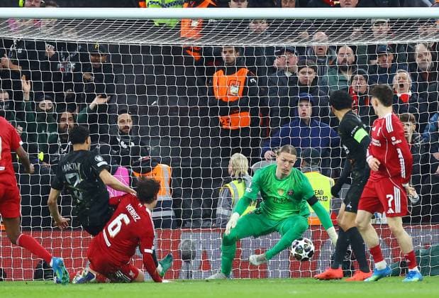 Milos Kerkez of Liverpool takes a shot Liverpool v Paris Saint-Germain, UEFA Champions League, Quarter Final, Second Leg, Football, Anfield, Liverpool, UK - 14 Apr 2026Liverpool Anfield France EDITORIAL USE ONLY No use with unauthorised audio, video, data, fixture lists, club league logos or live services. Online in-match use limited to 120 images, no video emulation. No use in betting, games or single club league player publications. Copyright: xMattxWest Shutterstockx 16828520ao