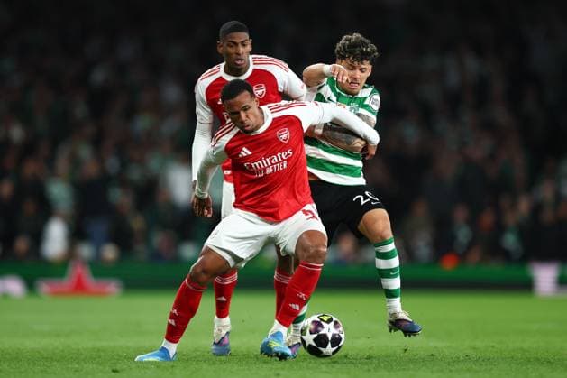 Gabriel of Arsenal under pressure from Maximiliano Araujo of Sporting CP Arsenal v Sporting, UEFA Champions League, Quarter Final, Second Leg, Football, Emirates Stadium, London, UK - 15 Apr 2026London Emirates Stadium United Kingdom EDITORIAL USE ONLY No use with unauthorised audio, video, data, fixture lists, club league logos or live services. Online in-match use limited to 120 images, no video emulation. No use in betting, games or single club league player publications. Copyright: xSimonxDael Shutterstockx 16828544bb