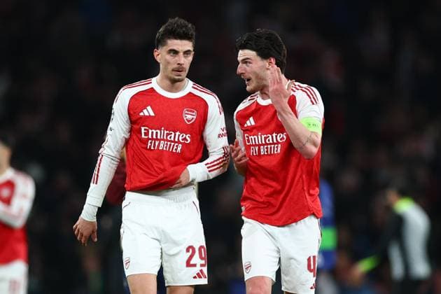 Kai Havertz of Arsenal and Declan Rice of Arsenal at full time Arsenal v Sporting, UEFA Champions League, Quarter Final, Second Leg, Football, Emirates Stadium, London, UK - 15 Apr 2026London Emirates Stadium United Kingdom EDITORIAL USE ONLY No use with unauthorised audio, video, data, fixture lists, club league logos or live services. Online in-match use limited to 120 images, no video emulation. No use in betting, games or single club league player publications. Copyright: xSimonxDael Shutterstockx 16828544bm