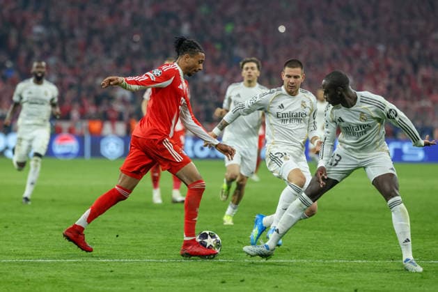 Michael Olise (FC Bayern Muenchen, 17) mit Ferland Mendy (Real Madrid CF, 23), GER, FC Bayern Muenchen vs. Real Madrid CF, Fussball, UEFA Champions League, Viertelfinale, Rueckspiel, Saison 2025 2026, 15.04.2026, GER, FC Bayern Muenchen vs. Real Madrid CF, Fussball, UEFA Champions League, Viertelfinale, Rueckspiel, Saison 2025 2026, 15.04.2026 Muenchen Copyright: xEibner-Pressefoto JennixMaulx EP_JML