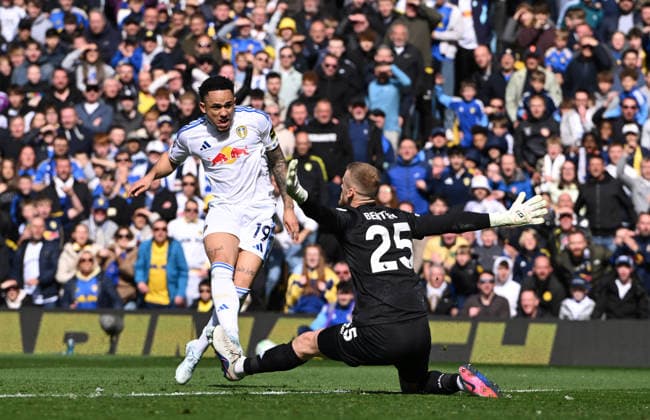 Noah Okafor of Leeds United scores the second goal 2-0 past Goalkeeper Daniel Bentley of Wolverhampton Wanderers Leeds United v Wolverhampton Wanderers, Premier League, Football, Elland Road, Leeds, UK - 18 Apr 2026Leeds Elland Road United Kingdom EDITORIAL USE ONLY No use with unauthorised audio, video, data, fixture lists, club league logos or live services. Online in-match use limited to 120 images, no video emulation. No use in betting, games or single club league player publications. Copyright: xGreigxCowie Shutterstockx 16832140y