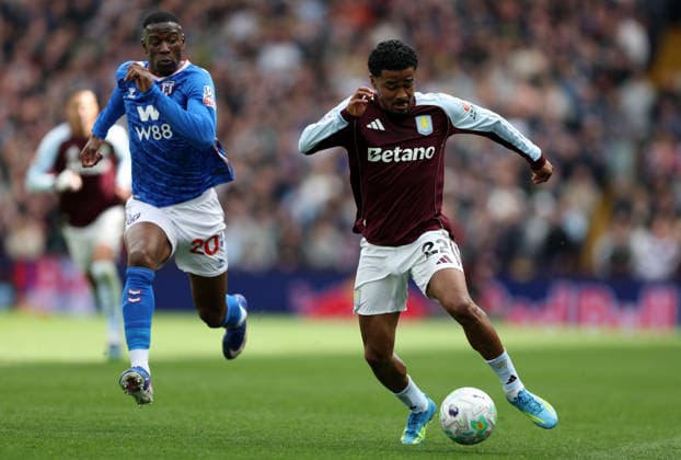 Ian Maatsen of Aston Villa and Nordi Mukiele of Sunderland in action Aston Villa v Sunderland, Premier League, Football, Villa Park, Birmingham, UK - 19 Apr 2026Birmingham Villa Park United Kingdom EDITORIAL USE ONLY No use with unauthorised audio, video, data, fixture lists, club league logos or live services. Online in-match use limited to 120 images, no video emulation. No use in betting, games or single club league player publications. Copyright: xKieranxMcManus Shutterstockx 16832205z