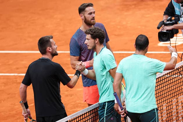 April 26, 2026, Madrid, Madrid, Spain: Theo Arribage of France, Albano Olivetti of France, Inigo Cervantes of Spain and Pablo Carreno Busta of Spain greet each other after the game ends during the Mutua Madrid Open 2026, ATP, Tennis Herren Masters 1000 and WTA, Tennis Damen 1000, at La Caja Magica on April 26, 2026 in Madrid, Spain. Mutua Madrid Open 2026 - Day 7 - ZUMAa181 20260426_zaa_a181_769 Copyright: xIrinaxR.xHipolitox