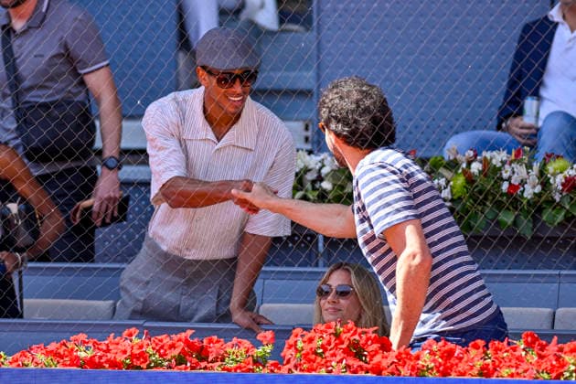April 28, 2026, Madrid, Madrid, Spain: JUDE BELLINGHAM a player for REAL MADRID CF, greets basketball player SERGIO LLULL during the Mutua Madrid Open 2026, ATP, Tennis Herren Masters 1000 and WTA, Tennis Damen 1000 tennis tournament, celebrated at Caja Magica on April 28, 2026 in Madrid, Spain. Madrid Spain - ZUMAc312 20260428_zsp_c312_256 Copyright: xOscarxManuelxSanchezx