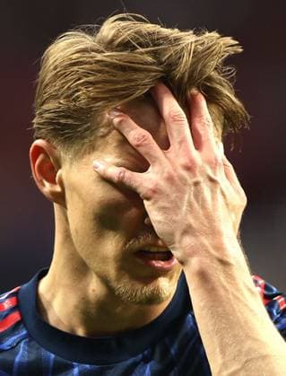 Martin odegaard of Arsenal shows a look of dejection Atletico Madrid v Arsenal, UEFA Champions League, Semi Final, First Leg, Football, Riyadh Air Metropolitano, Madrid, Spain - 29 Apr 2026Madrid Riyadh Air Metropolitano Spain EDITORIAL USE ONLY No use with unauthorised audio, video, data, fixture lists, club league logos or live services. Online in-match use limited to 120 images, no video emulation. No use in betting, games or single club league player publications. Copyright: xKieranxMcManus Shutterstockx 16847970ad