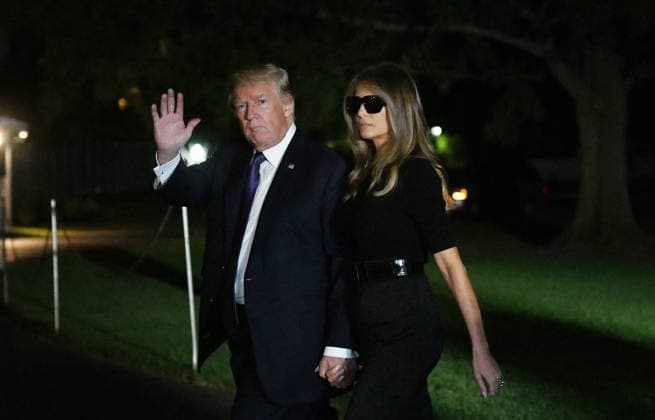 February 12, 2017 - Washington, District of Columbia, United States of America - United States President Donald J. Trump and first lady Melania Trump return to the White House from Las Vegas, Nevada October 4, 2017. The President and the first lady visited with civilian heroes and first responders from the deadliest mass shooting in US history. .Credit: Olivier Douliery Pool via CNP Copyright: xOlivierxDoulieryx