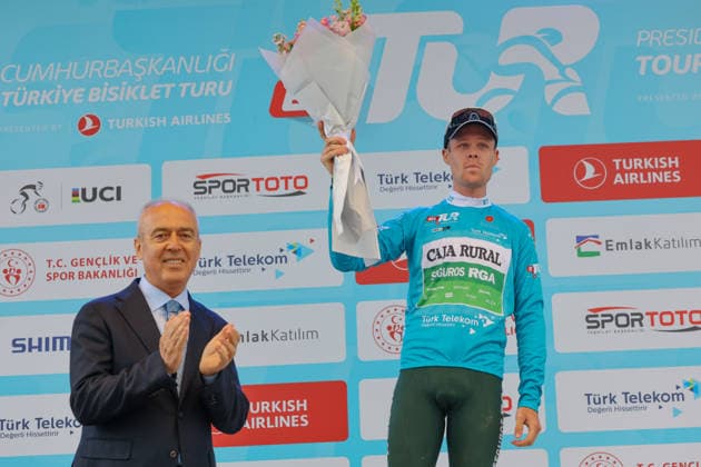 The 61st Presidential Cycling Tour of Turkiye (TUR 2026) has officially begun, starting with its opening stage in the coastal town of Cesme, Izmir. Held under the auspices of the Presidency of the Republic of Türkiye, this prestigious UCI ProSeries race brings together 23 teams and 161 world-class cyclists to compete over eight days, from April 26 to May 3, 2026...The 2026 edition unfolds across routes showcasing some of Türkiye s most striking landscapes. Starting in Cesme, the race follows the Aegean and Mediterranean coastlines, covering stages through Antalya and the southern shores before concluding in the capital, Ankara. Beyond sporting competition, the tour plays a key role in promoting Türkiye s natural and cultural richness on a global stage..This year, the race consists of 8 stages covering approximately 1,200 kilometers. Nearly 20 teams and over 150 riders from around the world are competing, under the coordination of the Turkish Cycling Federation..With the first three stages completed, the pace in the peloton has intensified and the general classification has begun to take shape. Sprint finishes and technically demanding routes have stood out, with the third stage drawing attention for its high tempo and dramatic finale..The third stage of the 61st Presidential Cycling Tour of Türkiye (TUR 2026) was won by Colombian rider Ivan Ramiro Sosa of Equipo Kern Pharma. Covering the 132.7-kilometer Marmaris-Kıran route, Sosa finished in 3 hours, 40 minutes, and 25 seconds. In the summit finish, Australian rider Sebastian Berwick of Caja Rural-Seguros RGA placed second, while French rider Nicolas Breuillard of TotalEnergies finished third..As the race progresses, challenging climbs and critical time gaps are expected to further heighten the excitement. The tour continues to deliver a compelling blend of elite competition and global vis Copyright: RizaxOzel 19081569