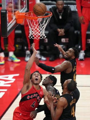 May 1, 2026, Toronto, On, Canada: Toronto Raptors Scottie Barnes (4) drives to the net against Cleveland Cavaliers Donovan Mitchell (45), Cleveland Cavaliers Evan Mobley (4) and Cleveland Cavaliers Dennis Schroder (8) during second half NBA, Basketball Herren, USA playoff basketball action in Toronto on Friday, May 1, 2026. Canada News - May 1, 2026 - ZUMAc35_ 20260501_zaf_c35_168 Copyright: xNathanxDenettex
