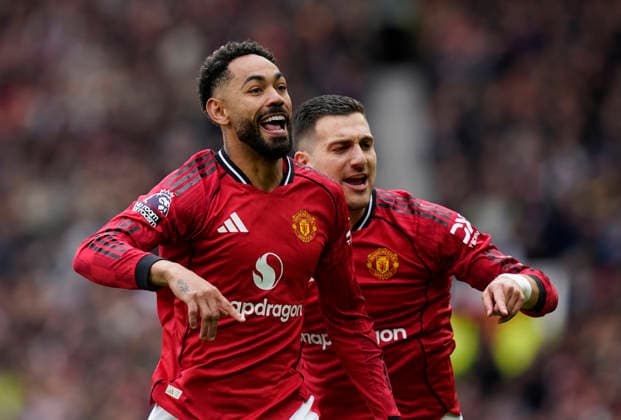 Manchester, England, 3rd May 2026. Matheus Cunha of Manchester United, ManU celebrates scoring the first goal during the Manchester United vs Liverpool Premier League match at Old Trafford, Manchester. Picture credit should read: Andrew Yates Sportimage EDITORIAL USE ONLY. No use with unauthorised audio, video, data, fixture lists, club league logos or live services. Online in-match use limited to 120 images, no video emulation. No use in betting, games or single club league player publications. SPI_025_AY_MAN_UTD_LIVERPOOL SPI-4776-0025