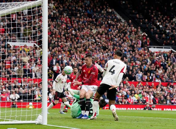Manchester, England, 3rd May 2026. Benjamin Sesko of Manchester United, ManU scoring the second goal during the Manchester United vs Liverpool Premier League match at Old Trafford, Manchester. Picture credit should read: Andrew Yates Sportimage EDITORIAL USE ONLY. No use with unauthorised audio, video, data, fixture lists, club league logos or live services. Online in-match use limited to 120 images, no video emulation. No use in betting, games or single club league player publications. SPI_050_AY_MAN_UTD_LIVERPOOL SPI-4776-0052