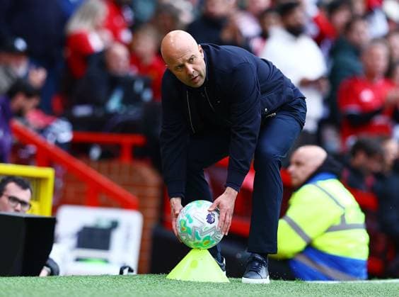 Liverpool manager Arne Slot collects the ball pitchside Manchester United, ManU v Liverpool, Premier League, Football, Old Trafford, Manchester , UK - 03 May 2026Manchester Old Trafford United Kingdom EDITORIAL USE ONLY No use with unauthorised audio, video, data, fixture lists, club league logos or live services. Online in-match use limited to 120 images, no video emulation. No use in betting, games or single club league player publications. Copyright: xMattxWest Shutterstockx 16854589bb