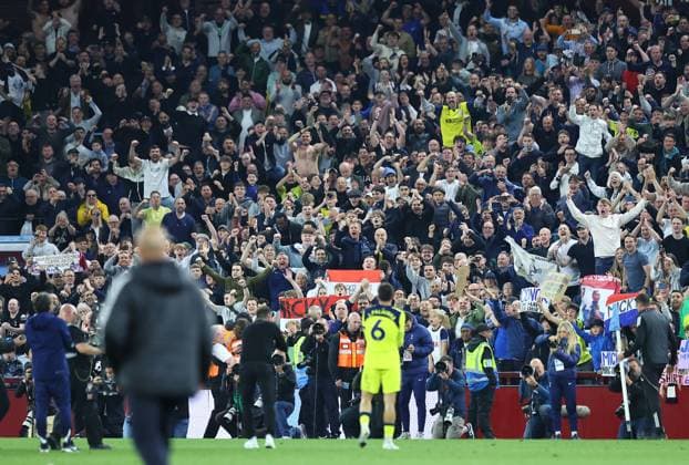 Fans of Tottenham Hotspur celebrate after the match Aston Villa v Tottenham Hotspur, Premier League, Football, Villa Park, Birmingham , UK - 03 May 2026Birmingham Villa Park United Kingdom EDITORIAL USE ONLY No use with unauthorised audio, video, data, fixture lists, club league logos or live services. Online in-match use limited to 120 images, no video emulation. No use in betting, games or single club league player publications. Copyright: xMichaelxZemanek Shutterstockx 16854596bc
