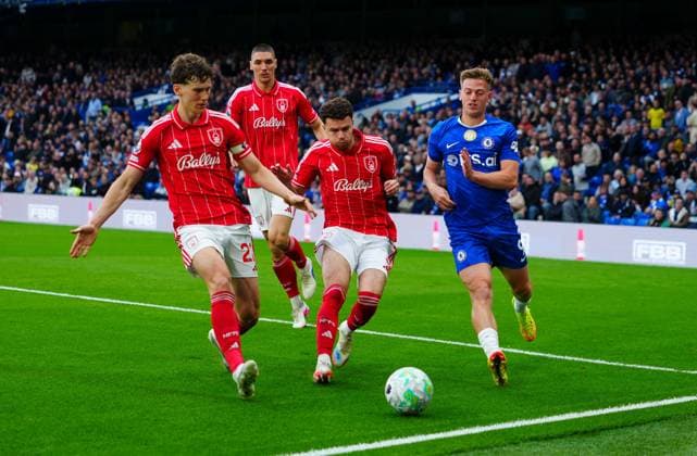 Liam Delap of Chelsea is crowded out by Ryan Yates, Nikola Milenkovic and Neco Williams of Nottingham Forest Chelsea v Nottingham Forest, Premier League, Football, Stamford Bridge, London , UK - 04 May 2026London Stamford Bridge United Kingdom EDITORIAL USE ONLY No use with unauthorised audio, video, data, fixture lists, club league logos or live services. Online in-match use limited to 120 images, no video emulation. No use in betting, games or single club league player publications. Copyright: xJavierxGarcia Shutterstockx 16854610cd