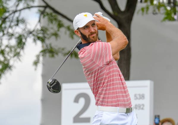Friday September 29, 2017: Dustin Johnson of the United States watches his tee shot on the 2nd hole during the second round of the Presidents Cup at Liberty National Golf Course in Jersey City, New Jersey. Gregory Vasil CSM Copyright: xGregoryxVasilx