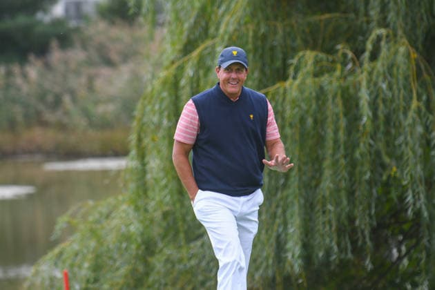 Friday September 29, 2017: Phil Mickelson of the United States watches acknowledges the fans approaching the 4th tee box during the second round of the Presidents Cup at Liberty National Golf Course in Jersey City, New Jersey. Gregory Vasil CSM Copyright: xGregoryxVasilx